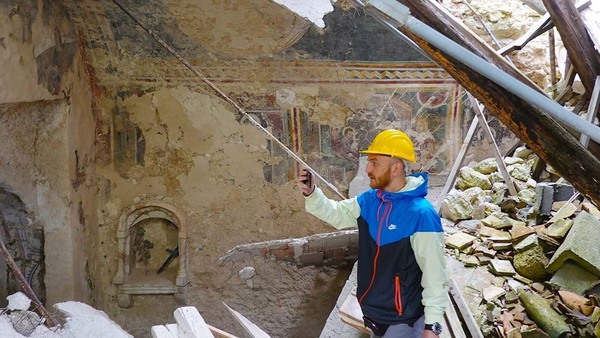 Master of Science in Historic Preservation student documenting a historical building.