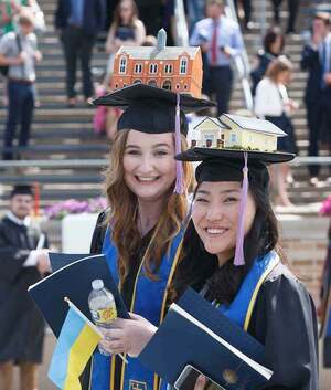 Bertram wearing her model of a Habitat for Humanity house during Notre Dame's 177th commencement ceremony on May 15, 2022.
